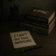 A somber image of a study desk with UPSC books and a note, symbolizing the stress faced by aspirants like Priyanshi in Indore.